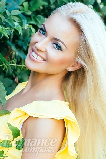 Ukrainian mail order bride Lyubov from Kiev with blonde hair and blue eye color - image 1