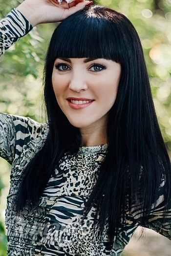 Ukrainian mail order bride Oksana from Kremenchug with black hair and grey eye color - image 1