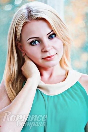 Ukrainian mail order bride Irina from Odessa with blonde hair and blue eye color - image 1