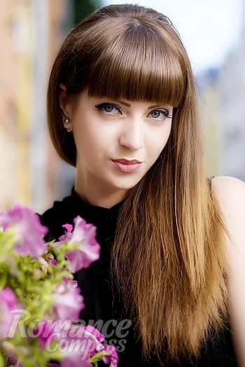 Ukrainian mail order bride Ksenia from Kiev with auburn hair and blue eye color - image 1