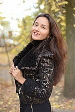 Ukrainian mail order bride Oksana from Nikolaev with light brown hair and hazel eye color - image 10