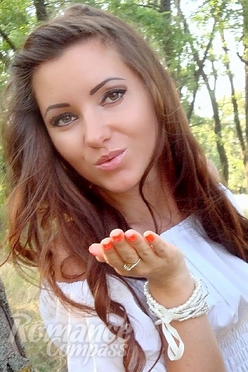 Ukrainian mail order bride Svetlana from Odessa with black hair and brown eye color - image 1