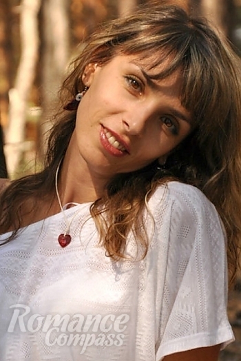 Ukrainian mail order bride Nataliya from Kherson with light brown hair and brown eye color - image 1