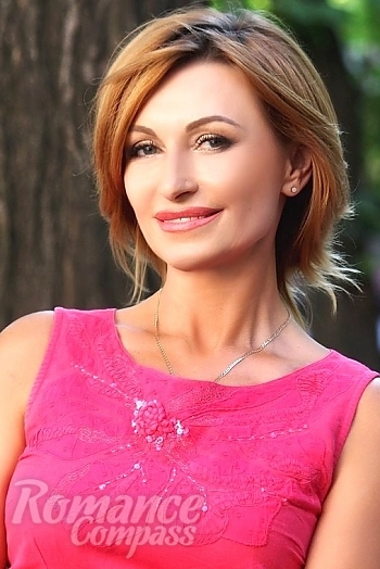 Ukrainian mail order bride Irina from Odessa with light brown hair and green eye color - image 1