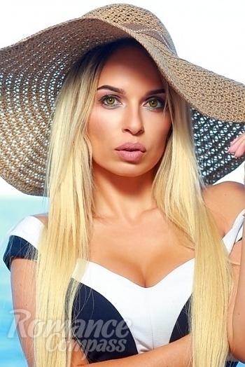 Ukrainian mail order bride Katty from Odessa with blonde hair and hazel eye color - image 1