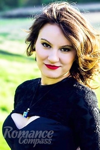 Ukrainian mail order bride Severina from Khmelnitckiy with brunette hair and green eye color - image 1