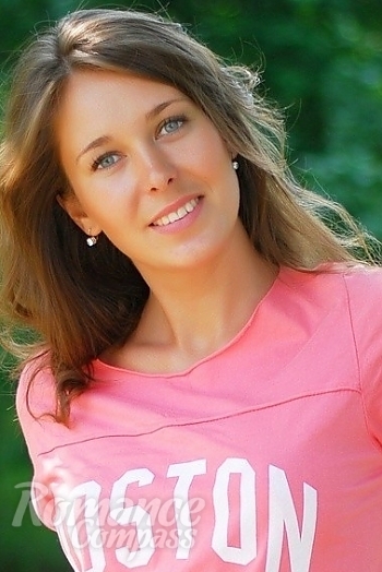 Ukrainian mail order bride Victoria from Zhitomir with light brown hair and blue eye color - image 1
