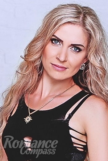 Ukrainian mail order bride Juliya from Poltava with blonde hair and grey eye color - image 1