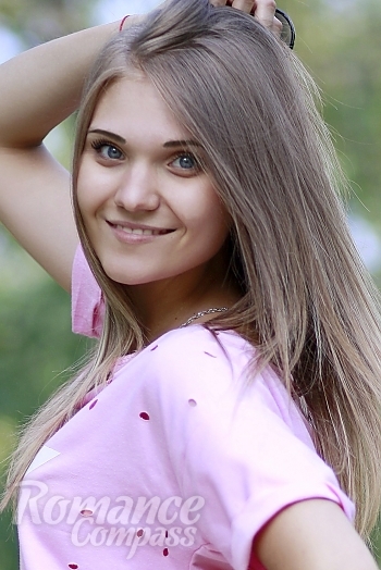 Ukrainian mail order bride Anna from Kiev with light brown hair and blue eye color - image 1