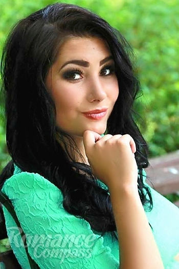 Ukrainian mail order bride Tanya from Kyiv with black hair and hazel eye color - image 1