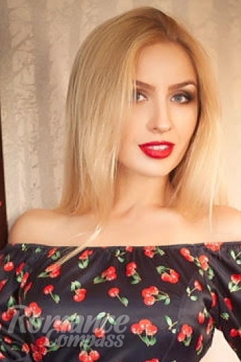 Ukrainian mail order bride Olga from Kiev with blonde hair and grey eye color - image 1