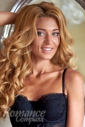 Ukrainian mail order bride Anastasiya from Kiev with blonde hair and grey eye color - image 1