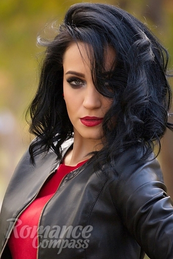 Ukrainian mail order bride Olesya from Chelyabinsk with black hair and green eye color - image 1