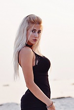Ukrainian mail order bride Mishel from Kiev with blonde hair and green eye color - image 4