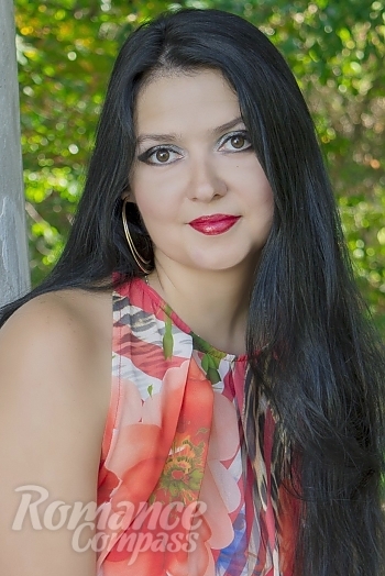 Ukrainian mail order bride Alena from Nikolaev with black hair and grey eye color - image 1