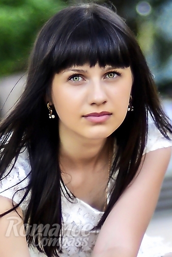 Ukrainian mail order bride Anastasia from Kharkov with black hair and green eye color - image 1