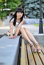 Ukrainian mail order bride Anastasia from Kharkov with black hair and green eye color - image 12