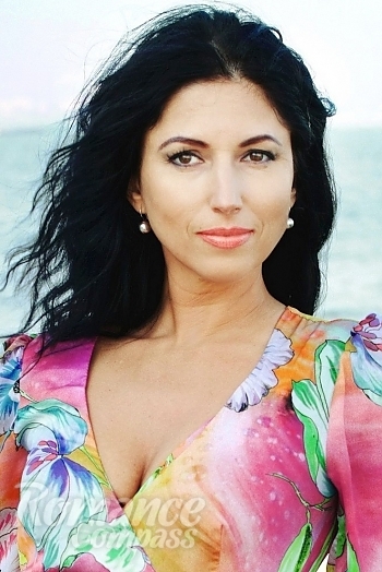 Ukrainian mail order bride Tatyana from Odessa with black hair and hazel eye color - image 1