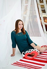 Ukrainian mail order bride Tanya from Nikolaev with brunette hair and hazel eye color - image 10