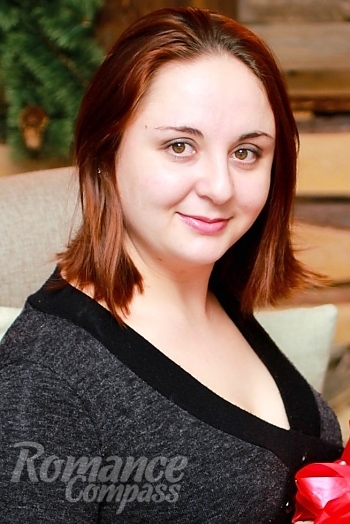 Ukrainian mail order bride Tanya from Nikolaev with brunette hair and hazel eye color - image 1
