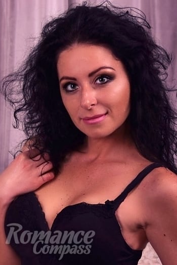 Ukrainian mail order bride Ludmila from Chornomorsk with black hair and green eye color - image 1