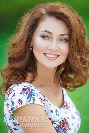 Ukrainian mail order bride Marina from Dnipro with light brown hair and green eye color - image 1