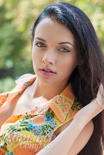 Ukrainian mail order bride Anna from Nikolaev with black hair and green eye color - image 1