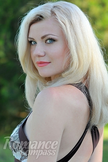 Ukrainian mail order bride Anna from Berdyansk with blonde hair and blue eye color - image 1
