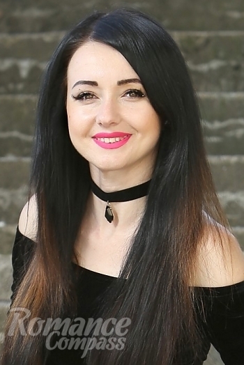 Ukrainian mail order bride Inna from Kiev with black hair and green eye color - image 1
