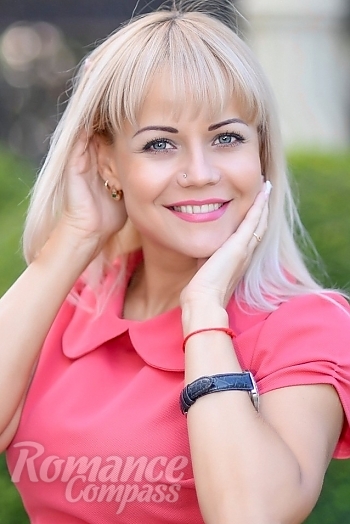 Ukrainian mail order bride Oksana from Odessa with blonde hair and blue eye color - image 1