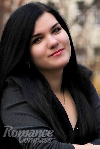 Ukrainian mail order bride Karina from Kharkov with black hair and hazel eye color - image 1