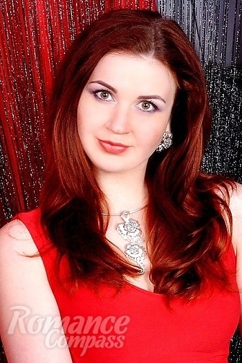 Ukrainian mail order bride Ekaterina from Kharkov with red hair and green eye color - image 1