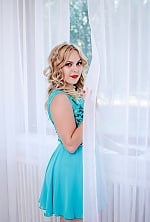 Ukrainian mail order bride Karina from Voznesensk with blonde hair and green eye color - image 8