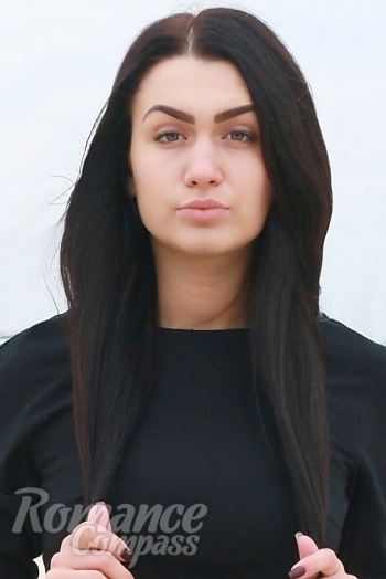 Ukrainian mail order bride Katya from Zaporozhye with black hair and green eye color - image 1
