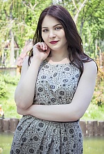 Ukrainian mail order bride Oksana from Kharkov with black hair and green eye color - image 6