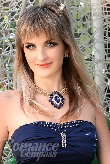 Ukrainian mail order bride Julia from Kharkov with blonde hair and blue eye color - image 1
