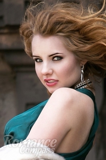 Ukrainian mail order bride Anna from Kiev with light brown hair and blue eye color - image 1