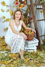 Ukrainian mail order bride Svetlana from Krivoy Rog with light brown hair and green eye color - image 7