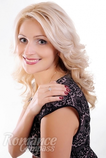 Ukrainian mail order bride Natasha from Kiev with blonde hair and blue eye color - image 1