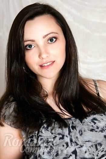 Ukrainian mail order bride Yana from Kiev with light brown hair and green eye color - image 1