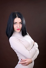 Ukrainian mail order bride Valentina from Nova Kachovka with black hair and brown eye color - image 5
