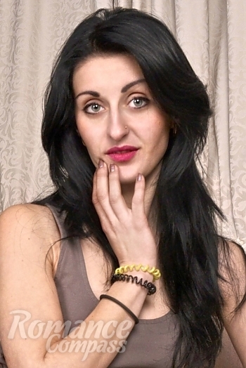 Ukrainian mail order bride Marina from Kiev with black hair and green eye color - image 1