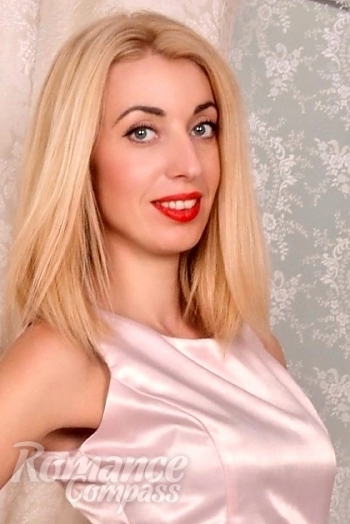Ukrainian mail order bride Olga from Kiev with blonde hair and green eye color - image 1