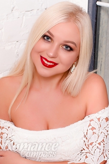 Ukrainian mail order bride Yana from Cherkasy with blonde hair and blue eye color - image 1
