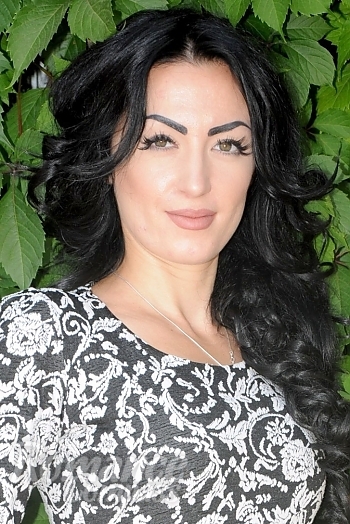 Ukrainian mail order bride Natalya from Kiev with black hair and hazel eye color - image 1