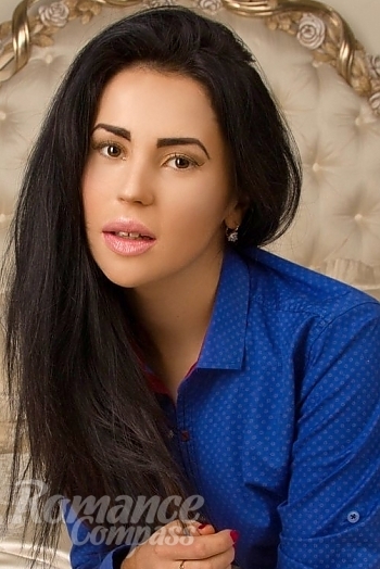Ukrainian mail order bride Nadia from Kiev with black hair and brown eye color - image 1