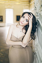 Ukrainian mail order bride Oksana from Berdyansk with brunette hair and green eye color - image 10