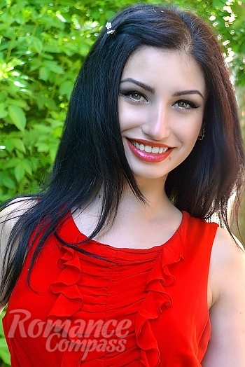 Ukrainian mail order bride Nataliya from Khmelnitsky with black hair and hazel eye color - image 1