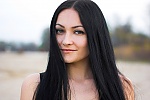 Ukrainian mail order bride Ludmila from Poltava with black hair and green eye color - image 2