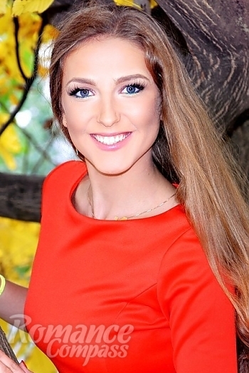 Ukrainian mail order bride Marina from Kharkov with light brown hair and blue eye color - image 1